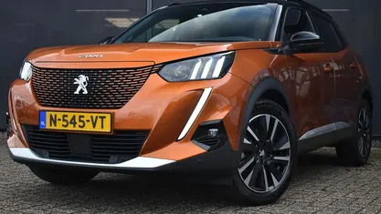 Oranje Gebruikt 2021 Peugeot e-2008 GT SUV | € 17.895 (Eerlijke prijs)