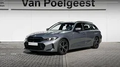 Skyscraper grey metallic (grijs metallic) Gebruikt 2023 BMW 318 Shadowline Stationwagen | € 39.900 (Eerlijke prijs)