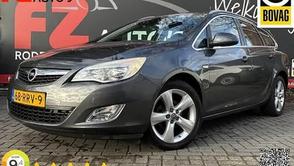 Grijs Gebruikt 2011 Opel Astra Cosmo Stationwagen | € 5.445 (Eerlijke prijs)
