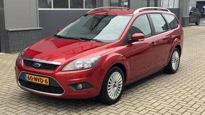 Oranje (metallic) Gebruikt 2010 Ford Focus Limited Stationwagen | € 2.350 (Eerlijke prijs)