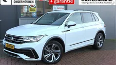 Wit (metallic) Gebruikt 2021 VW Tiguan R-line SUV | € 34.399 (Eerlijke prijs)
