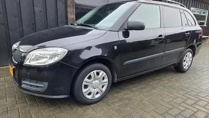Occasion Skoda Fabia Tour 86 PK (63 kW) 2009 Zwart (metallic) Stationwagen