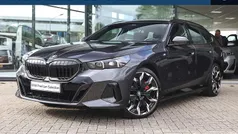 Grijs Gebruikt 2025 BMW 550e M Sport Stationwagen | € 92.950 (Goede deal)