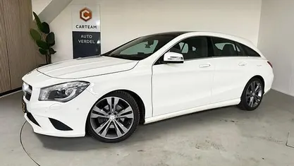 Occasion Mercedes CLA180 Shooting Brake OrangeArt Edition 122 PK (89 kW) 2016 Wit Stationwagen