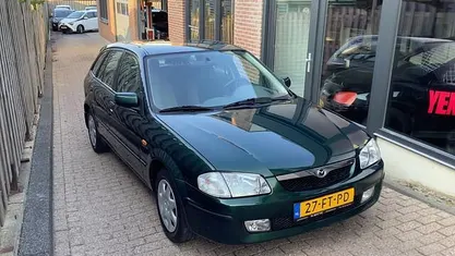 Occasion Mazda 323 88 PK (64 kW) 2000 Groen (metallic) Hatchback