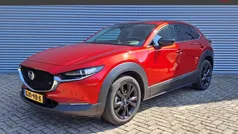 Rood metallic Gebruikt 2022 Mazda CX-30 Homura-Line SUV | € 29.995 (Eerlijke prijs)