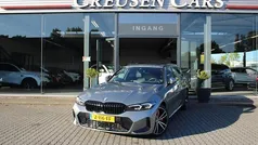 Grijs Gebruikt 2022 BMW 330 Executive Stationwagen | € 42.500 (Eerlijke prijs)