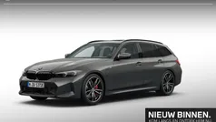 Bmw individual dravitgrau (donker grijs) Gebruikt 2023 BMW 330e M Sport Stationwagen | € 51.895 (Eerlijke prijs)