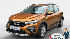 Oranje Gebruikt 2021 Dacia Sandero Comfort Hatchback | € 13.735 (Eerlijke prijs)