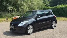 Zwart, metallic lak Gebruikt 2013 Suzuki Swift Exclusive Hatchback | € 8.450 (Eerlijke prijs)