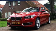 Rood, metallic lak Gebruikt 2016 BMW 230 Executive Coupé | € 18.945 (Eerlijke prijs)
