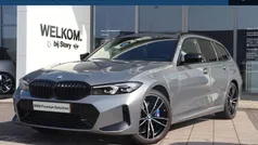 Skyscraper grey Gebruikt 2024 BMW 320e M Sport Stationwagen | € 46.450 (Eerlijke prijs)