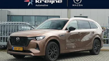 Melting copper metallic Occasion 2025 Mazda CX-80 Homura-Line SUV | € 59.925 (Eerlijke prijs)