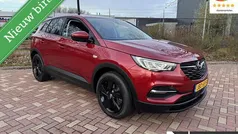 Rood, metallic lak Gebruikt 2021 Opel Grandland X Business Edition SUV | € 23.440 (Eerlijke prijs)