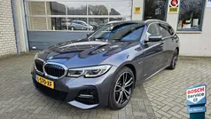 Grijs Gebruikt 2021 BMW 320e M Sport Stationwagen | € 29.950 (Eerlijke prijs)