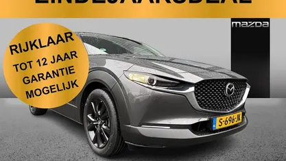 Machine gray Gebruikt 2023 Mazda CX-30 Homura-Line SUV | € 29.895 (Eerlijke prijs)