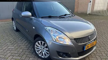Grijs (metallic) Occasion 2011 Suzuki Swift Exclusive Hatchback | € 3.995 (Eerlijke prijs)