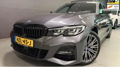 Grijs Gebruikt 2022 BMW 330e M Sport Stationwagen | € 32.950 (Goede deal)