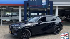 Zwart, metallic lak Gebruikt 2024 Mazda CX-60 Homura-Line SUV | € 48.950 (Eerlijke prijs)