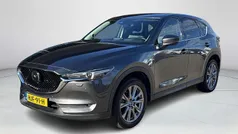 Machine gray metallic (46g) grijs Gebruikt 2019 Mazda CX-5 Luxury SUV | € 27.835 (Eerlijke prijs)