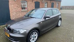 Bruin Gebruikt 2009 BMW 116 Hatchback | € 3.900 (Eerlijke prijs)
