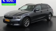 Grijs Gebruikt 2021 BMW 320e Sport Line Stationwagen | € 30.690 (Goede deal)