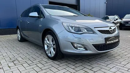 Occasion Opel Astra Cosmo 140 PK (102 kW) 2012 Grijs Stationwagen