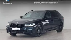 Zwart Gebruikt 2023 BMW 530e M Sport Stationwagen | € 47.450 (Eerlijke prijs)