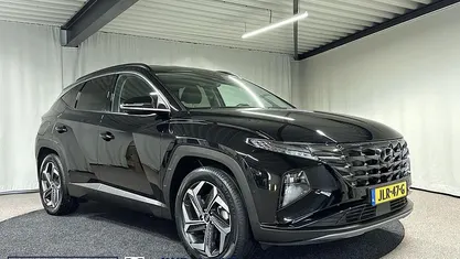 Zwart Gebruikt 2022 Hyundai Tucson Premium SUV | € 31.595 (Eerlijke prijs)