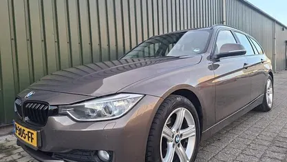 Bruin Gebruikt 2013 BMW 316 Executive Stationwagen | € 7.299 (Goede deal)