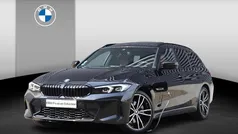 Zwart Gebruikt 2022 BMW 320e Executive Stationwagen | € 40.900 (Eerlijke prijs)