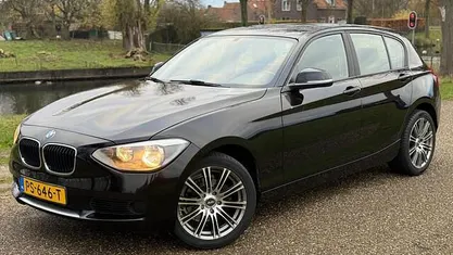 Zwart Gebruikt 2014 BMW 114 Hatchback | € 7.995 (Eerlijke prijs)