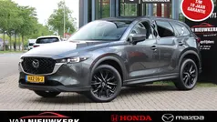 Machine grey (grijs metallic) Gebruikt 2023 Mazda CX-5 Exclusive-Line SUV | € 39.400 (Eerlijke prijs)