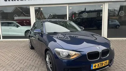 Blauw (metallic) Occasion 2014 BMW 114 Urban Line Hatchback | € 7.940 (Eerlijke prijs)