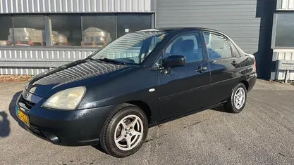 Zwart (metallic) Occasion 2003 Suzuki Liana GLX Sedan | € 1.295 (Eerlijke prijs)