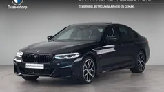 Zwart Gebruikt 2023 BMW 530e Comfort Edition Sedan | € 47.750 (Eerlijke prijs)