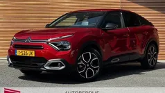 Rood, metallic lak Gebruikt 2023 Citroën e-C4 Shine SUV | € 19.500 (Eerlijke prijs)