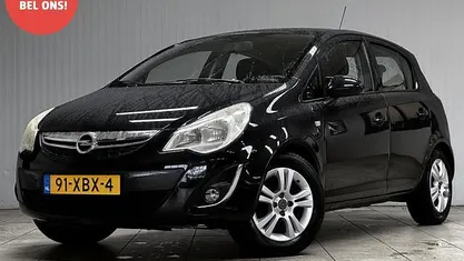 Zwart (metallic) Occasion 2012 Opel Corsa Cosmo Hatchback | € 3.995 (Eerlijke prijs)