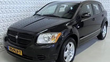 Zwart (metallic) Gebruikt 2011 Dodge Caliber Hatchback | € 2.499 (Super prijs)