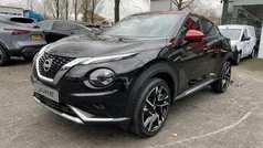 Two tone carbon black metallic/dak fuji sunset red (donker zwart) Nieuw 2025 Nissan Juke SUV | € 32.600 (Eerlijke prijs)