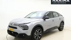 Grijs Gebruikt 2023 Citroën e-C4 Feel SUV | € 21.950 (Eerlijke prijs)