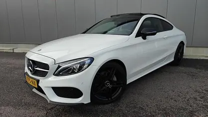 Wit Occasion 2018 Mercedes C180 AMG Line Premium Coupé | € 23.940 (Eerlijke prijs)