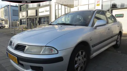 Grijs Occasion 1999 Mitsubishi Carisma Elegance Hatchback | € 990 (Eerlijke prijs)