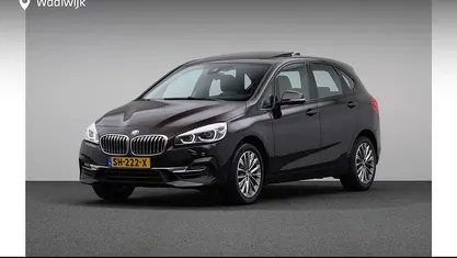 Bruin Occasion 2018 BMW 220 Executive Stationwagen | € 19.880 (Eerlijke prijs)