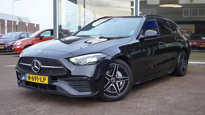 Zwart Gebruikt 2021 Mercedes C200 AMG line Stationwagen | € 29.950 (Eerlijke prijs)