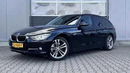 Occasion BMW 330 Executive 259 PK (190 kW) 2013 Zwart Stationwagen