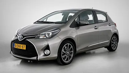 Bruin Gebruikt 2015 Toyota Yaris Hybrid Hatchback | € 14.900 (Eerlijke prijs)