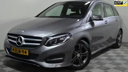 Grijs (metallic) Gebruikt 2015 Mercedes B180 Ambition MPV | € 13.950 (Eerlijke prijs)