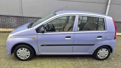 Occasion Daihatsu Cuore 59 PK (43 kW) 2006 Hatchback