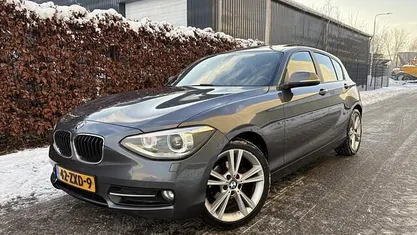 Grijs Occasion 2013 BMW 114 Sport Line Hatchback | € 6.450 (Eerlijke prijs)